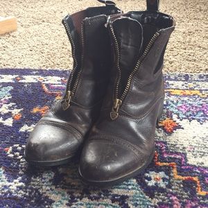 Dark brown Ariat paddock boots.